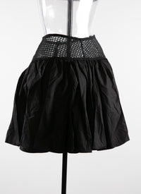 Mini-jupe plissée avec détails ajourés - Noir