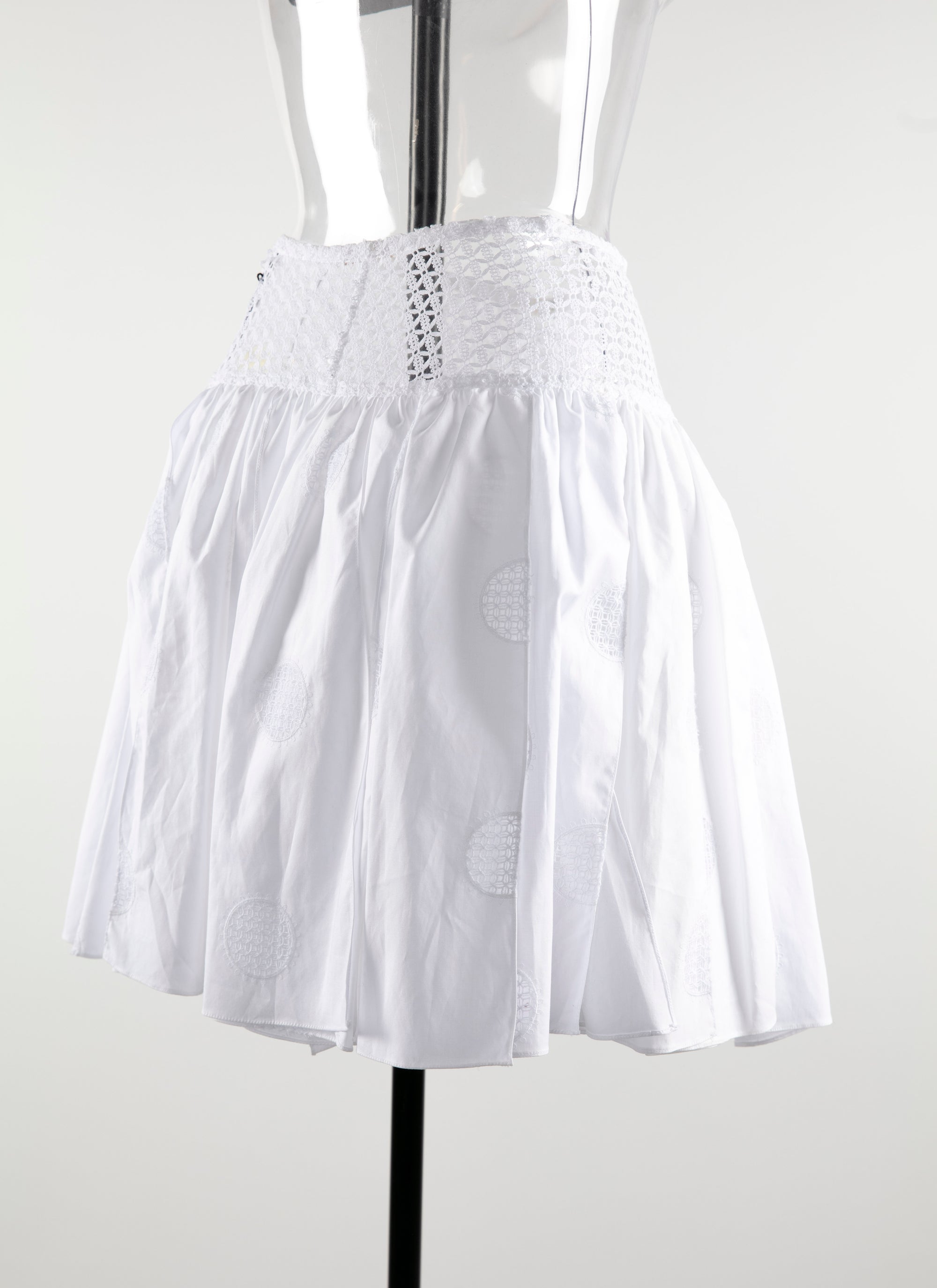 Pleated mini-skirt with openwork details - White