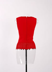 Sleeveless knitted ruffle jumper - Lacquer