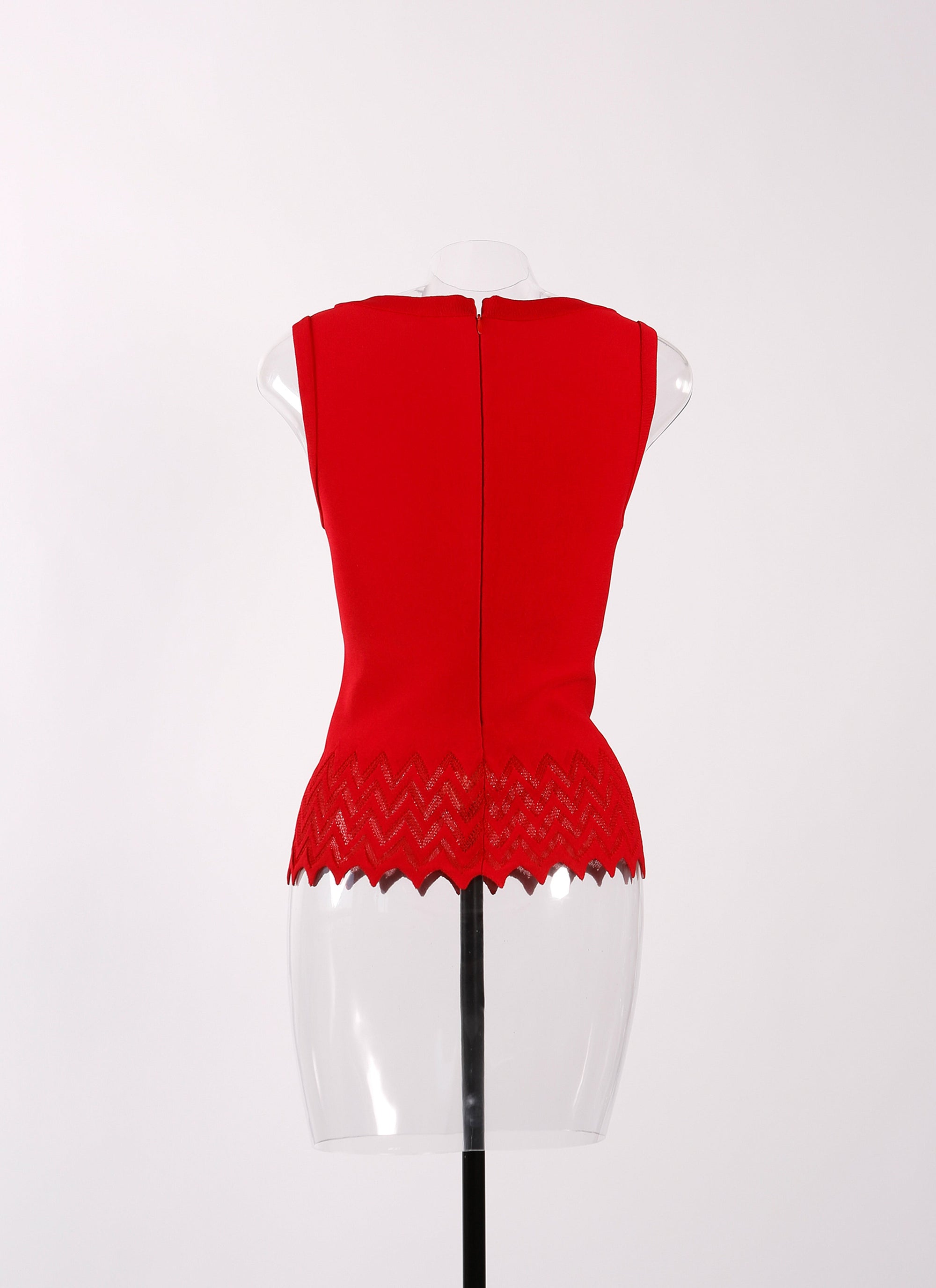 Sleeveless knitted ruffle jumper - Lacquer