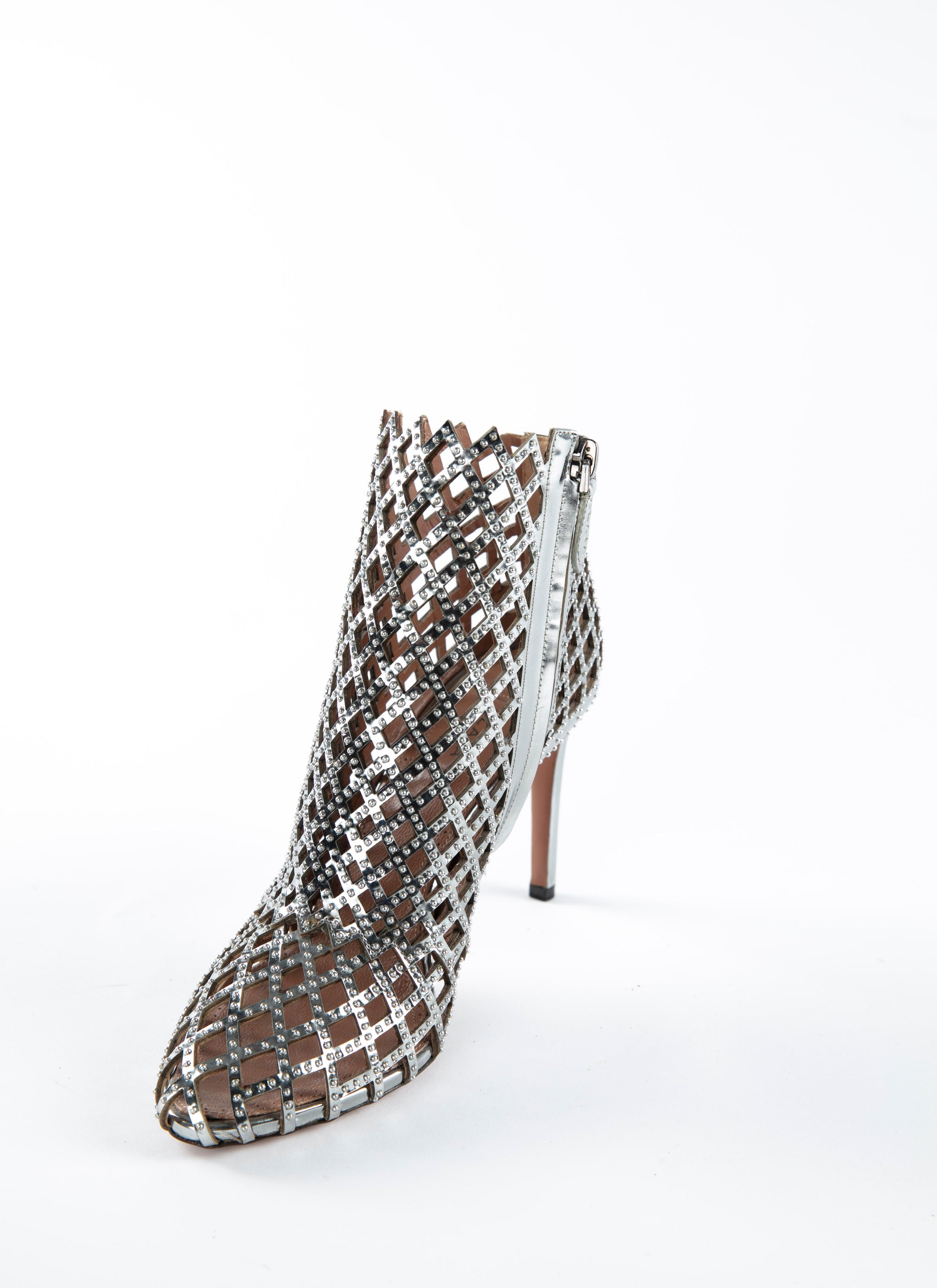 All-over perforated and studded 90 boots in leather - Rhodium