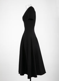 Robe longue évasée à col rond et manches courtes en laine - Noir