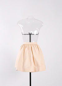 Short asymmetric openwork skirt - Nude
