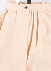 Short asymmetric openwork skirt - Nude