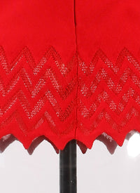 Knitted ruffle sleeveless jumper - Lacquer